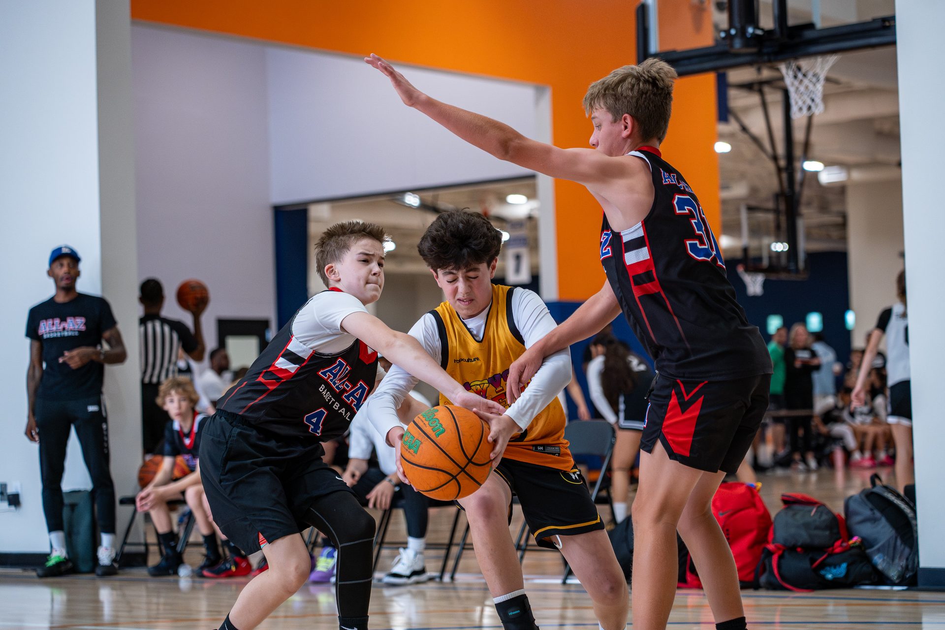 A Swysh Den Club Team player battling for the ball in a tournament game