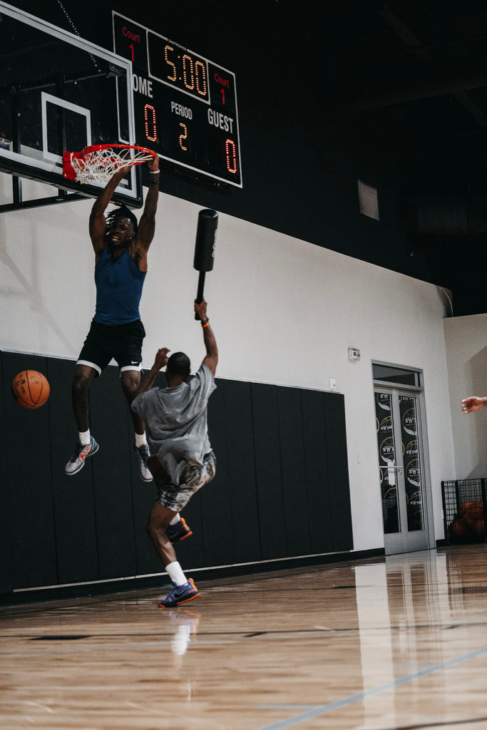 A Swysh Flight School player finishing an explosive dunk
